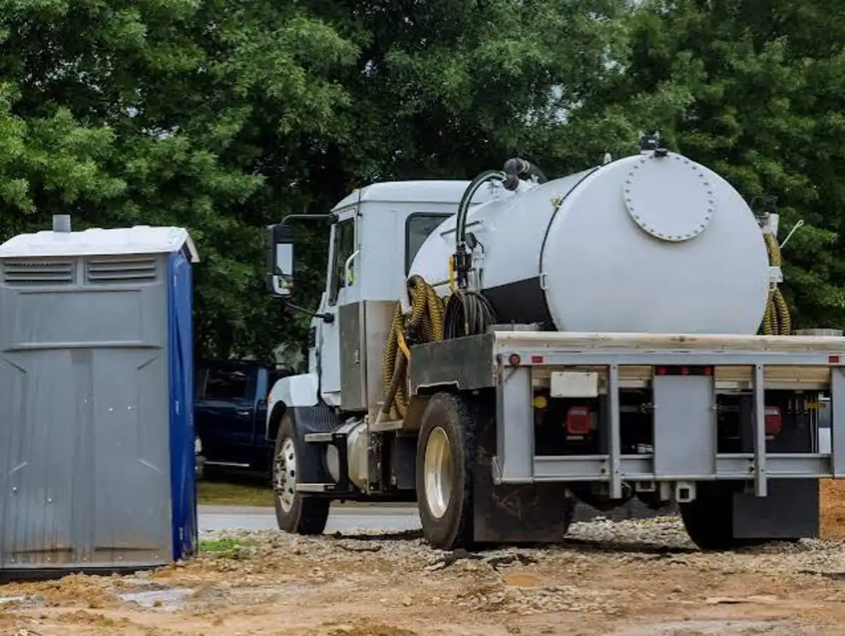 RV holding tank pumping - septic pump truck parked onsite for a service call